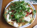 Riesen-Rösti mit Mozzarella, Tomaten und Rucola